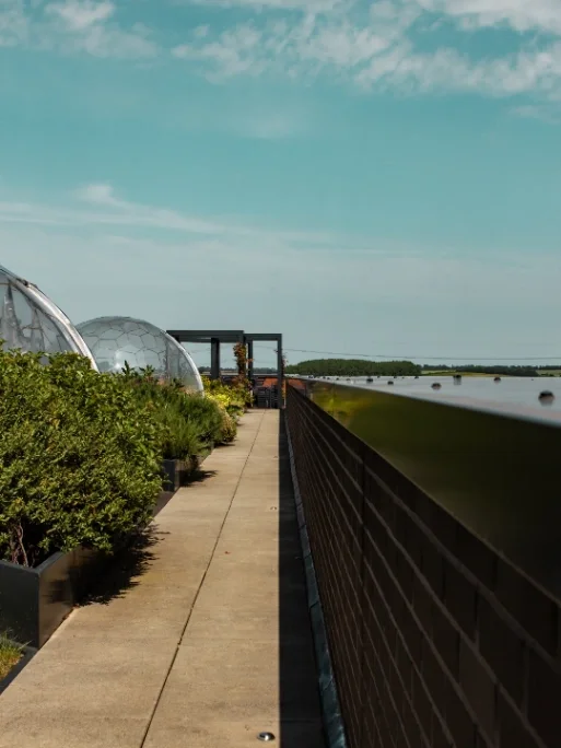 Residents at The Wharf, Waterside Village, have access to:  ▪︎ A rooftop terrace garden ▪︎ A fully equipped gym and fitness studio ▪︎ Concierge service ▪︎ Parking within the secure complex car park ▪︎ Contemporary, communal working spaces